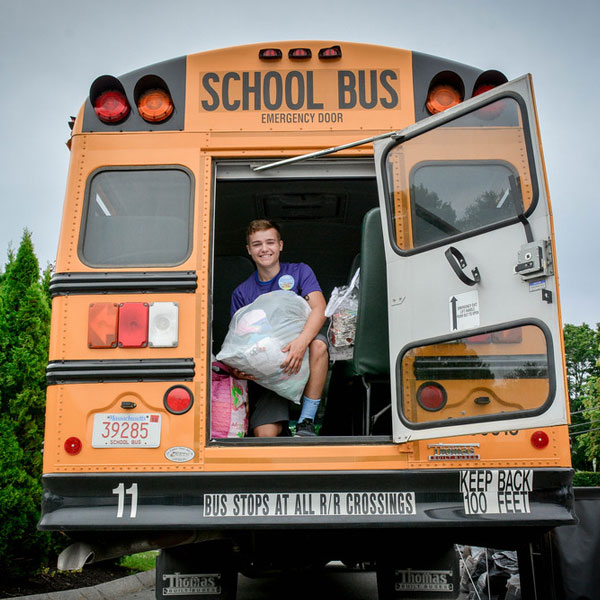 Bus filled with donations for school aged children