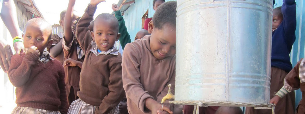 kids using a clean water station