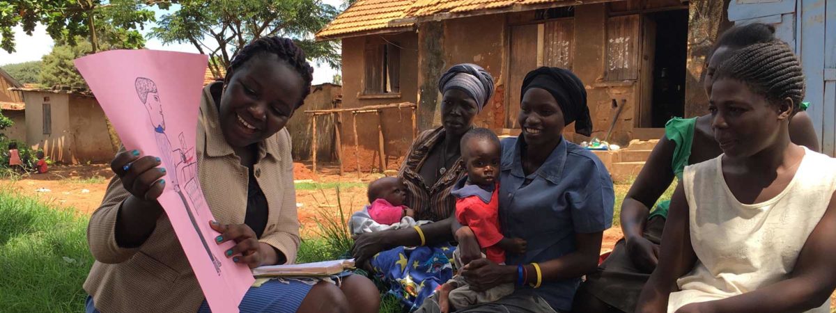 African women gathered together with their children for a counseling session