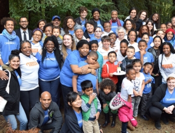 Large group of women and children pose for a picture