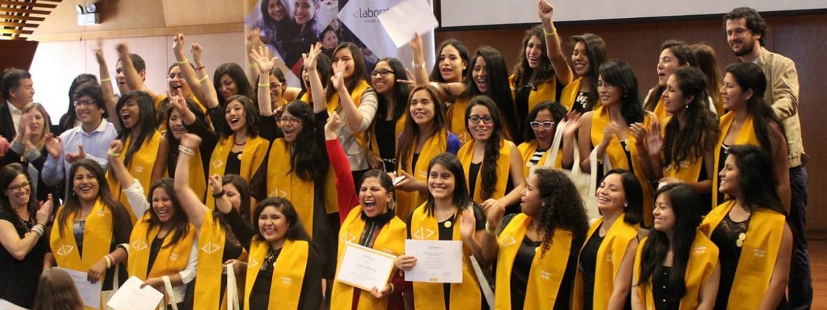 A large group of women celebrate their graduation