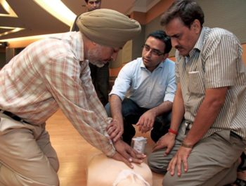 Three Indian men learn CPR