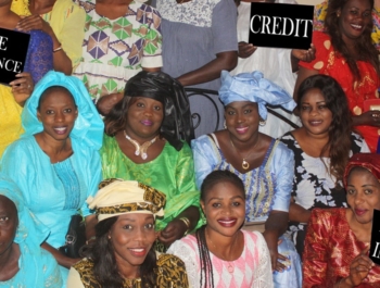 A large group of African women smile