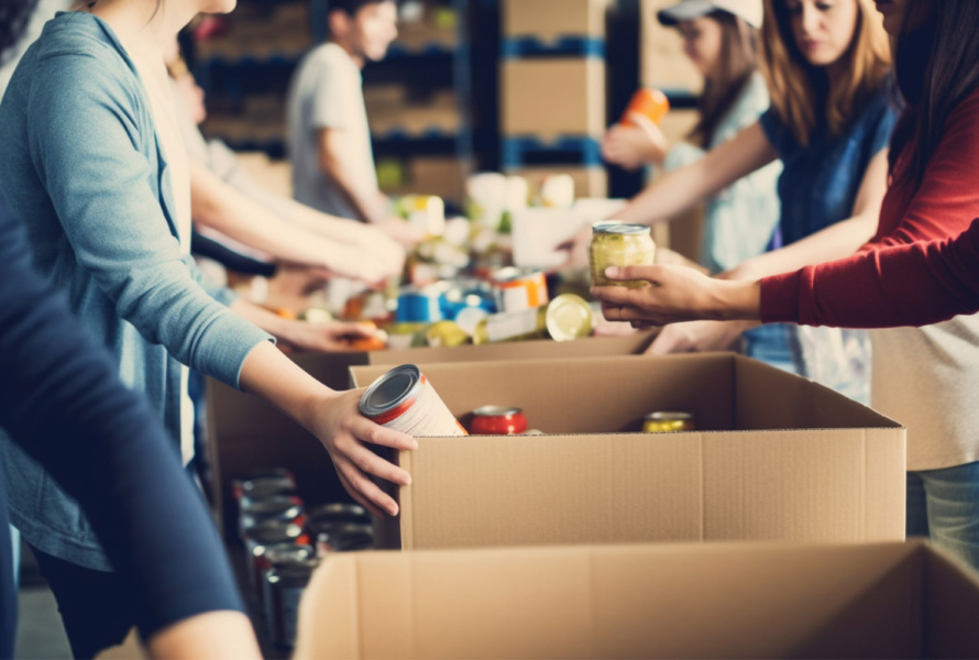 People volunteering at a food bank