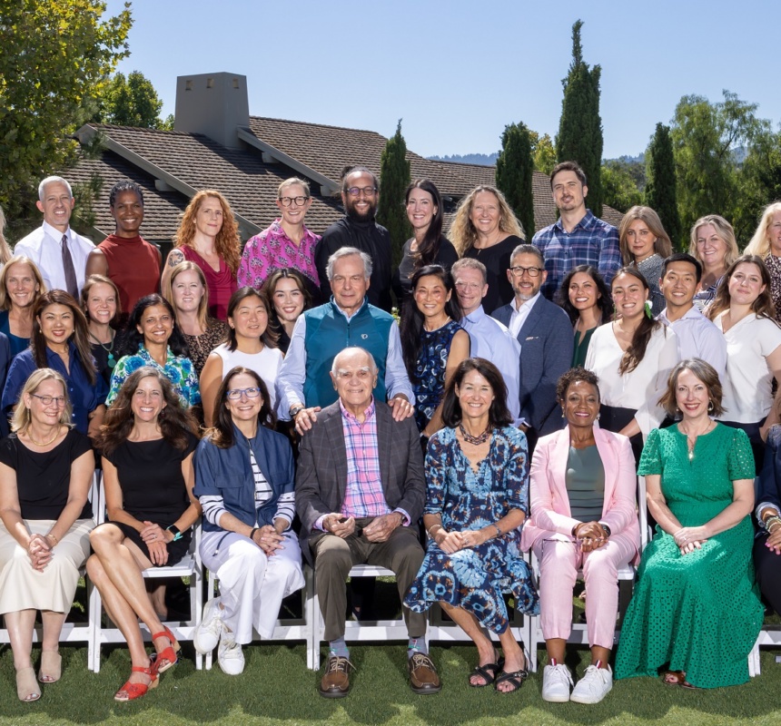 DRK's staff of roughly 40 people stand outside and smile