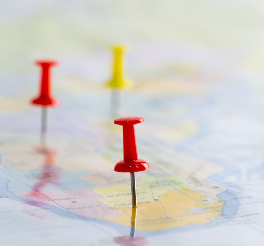 Push pin on the world map