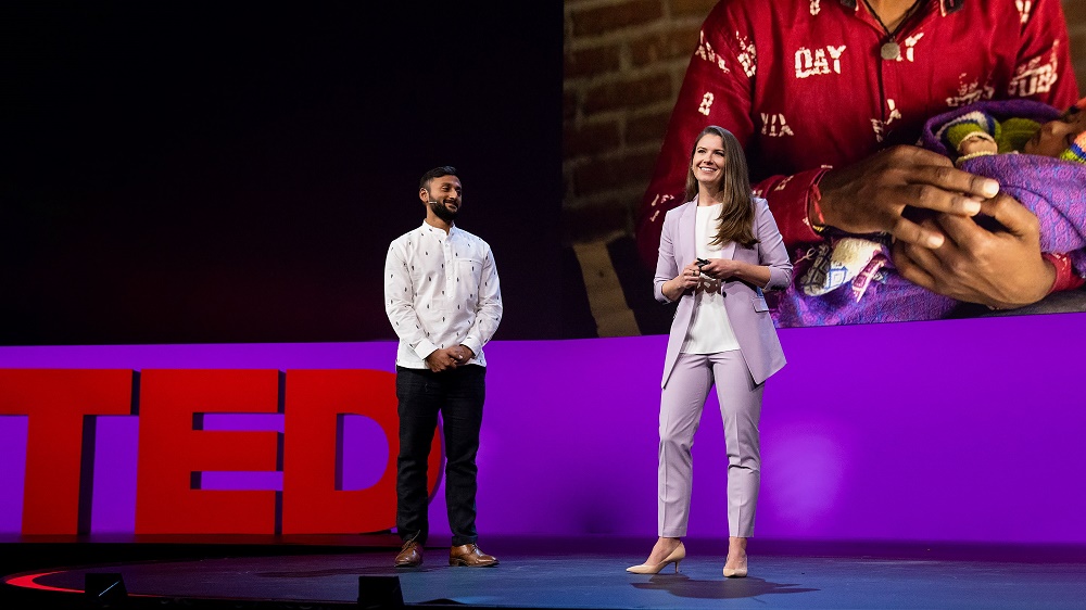 Edith Elliot and Shahed Alam stand on the stage at TED