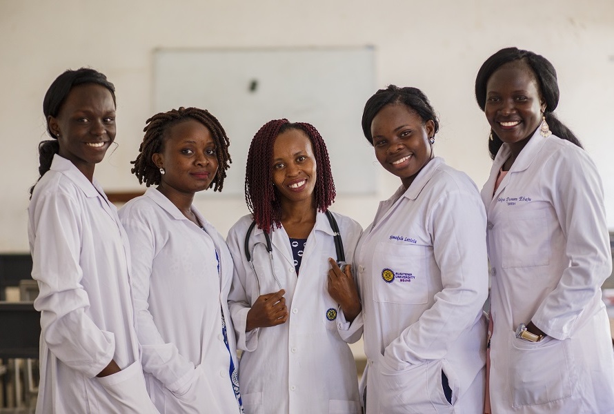 A group of health workers stand together